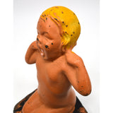 Vintage CAST IRON DOORSTOP Original Paint YAWNING BABY-KID by "M-L CORP" c.1931