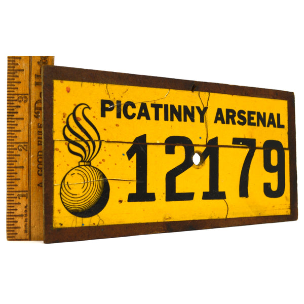 Vintage PICATINNY ARSENAL SIGN/NUMBER-PLATE Sticker on Wood CANNONBALL BOMB LOGO